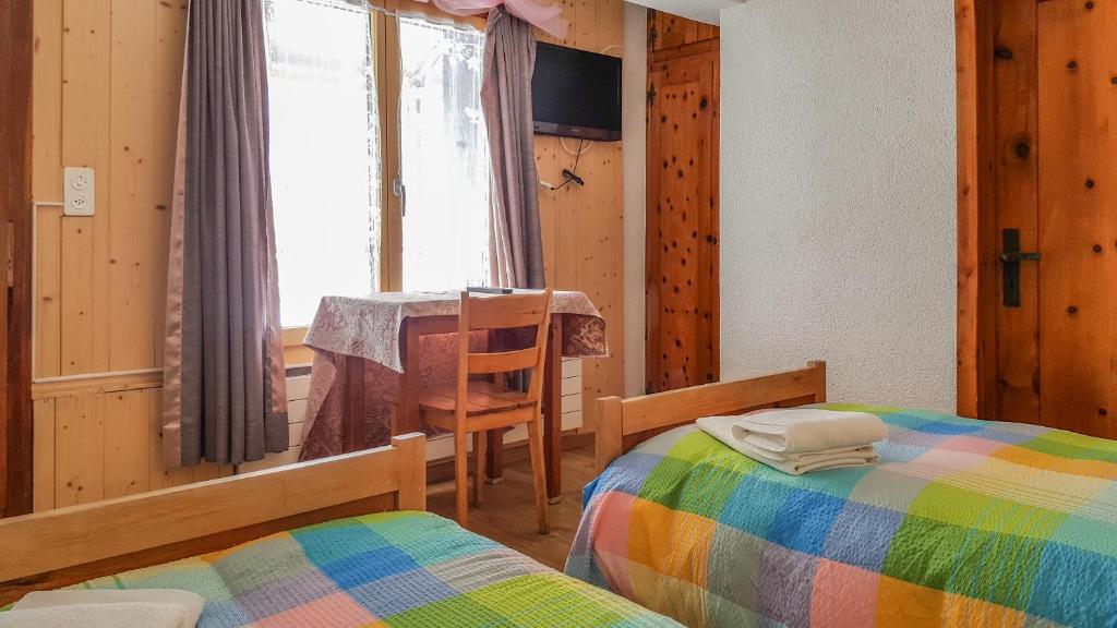 Postel nebo postele na pokoji v ubytování Hotel Restaurant Monte Leone