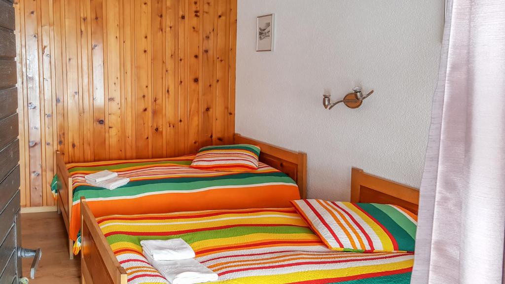 Postel nebo postele na pokoji v ubytování Hotel Restaurant Monte Leone