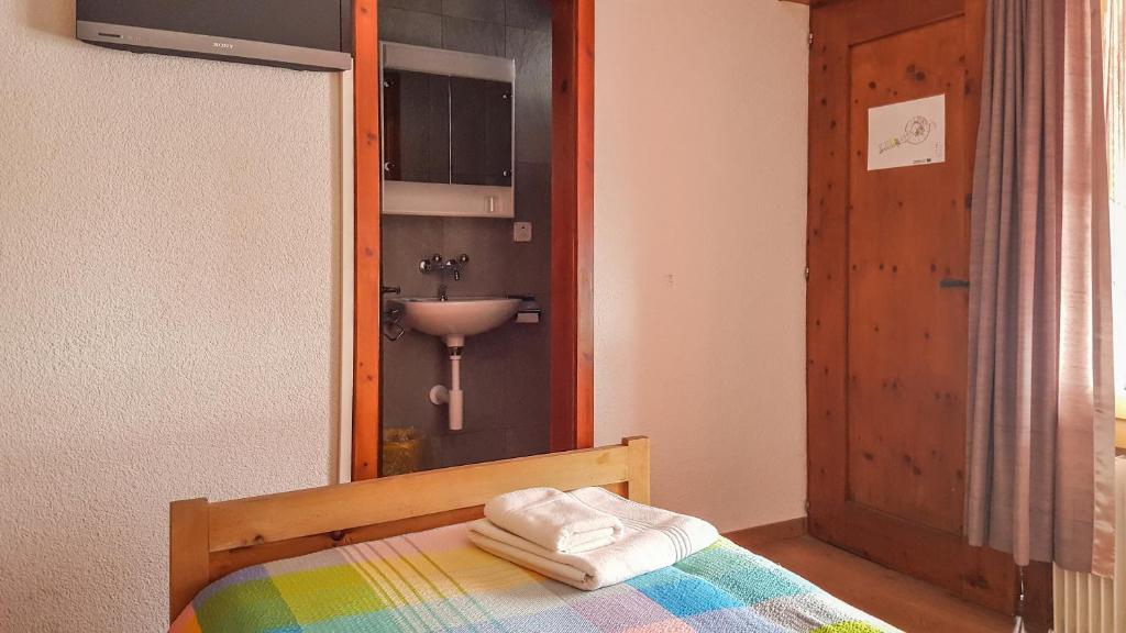 Postel nebo postele na pokoji v ubytování Hotel Restaurant Monte Leone