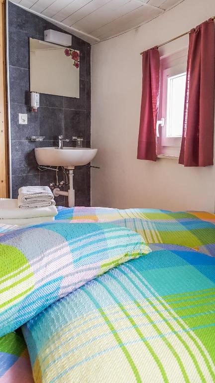 Postel nebo postele na pokoji v ubytování Hotel Restaurant Monte Leone