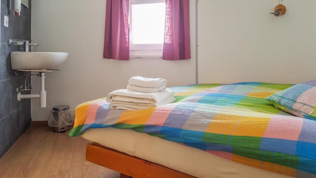 Postel nebo postele na pokoji v ubytování Hotel Restaurant Monte Leone