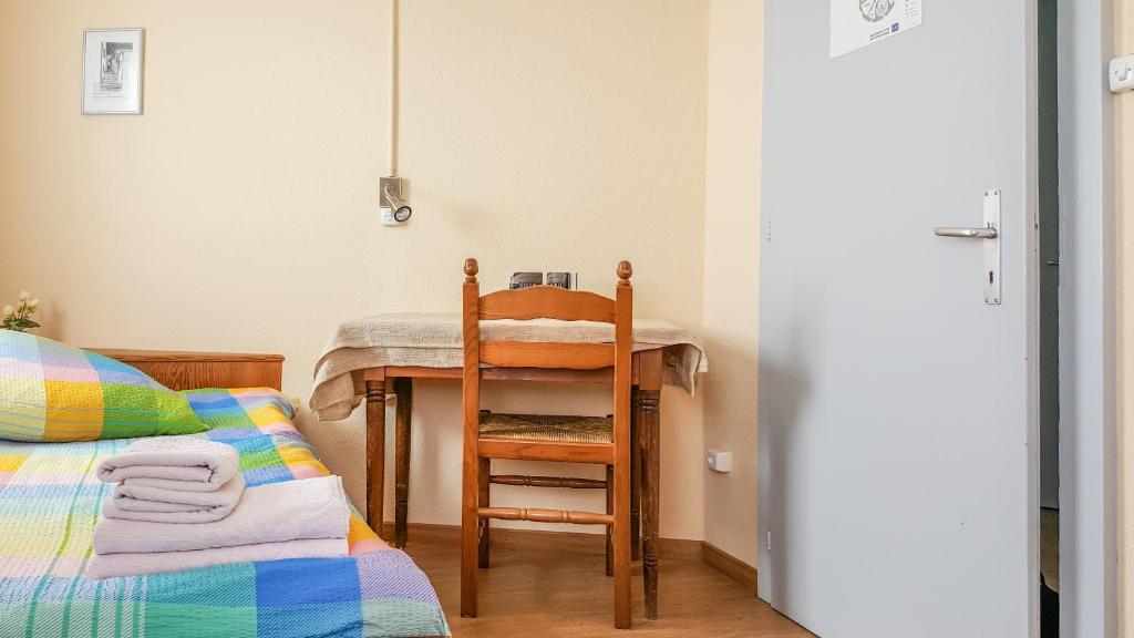 Postel nebo postele na pokoji v ubytování Hotel Restaurant Monte Leone