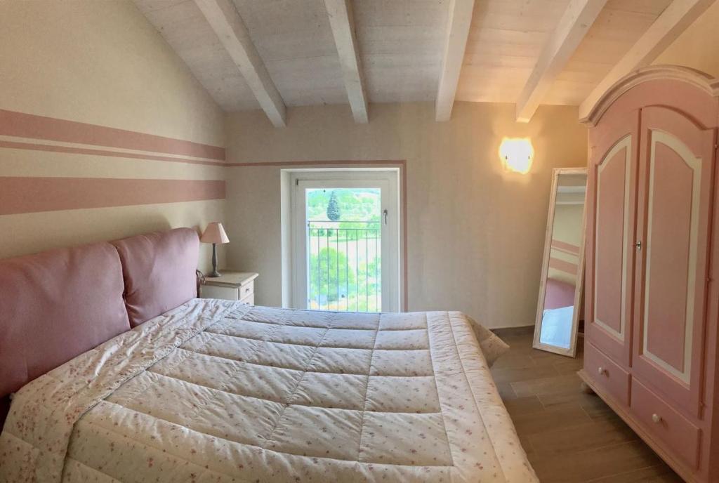 Postel nebo postele na pokoji v ubytování Casa Bardalla