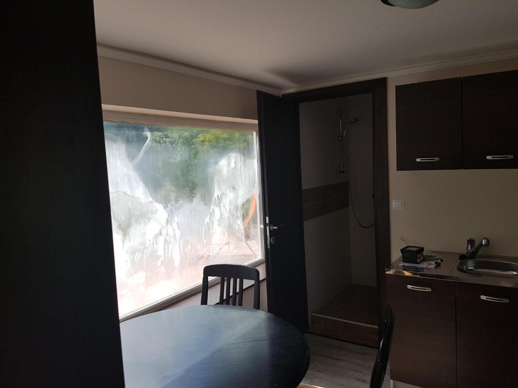 Kuchyň nebo kuchyňský kout v ubytování Meszaros apartman