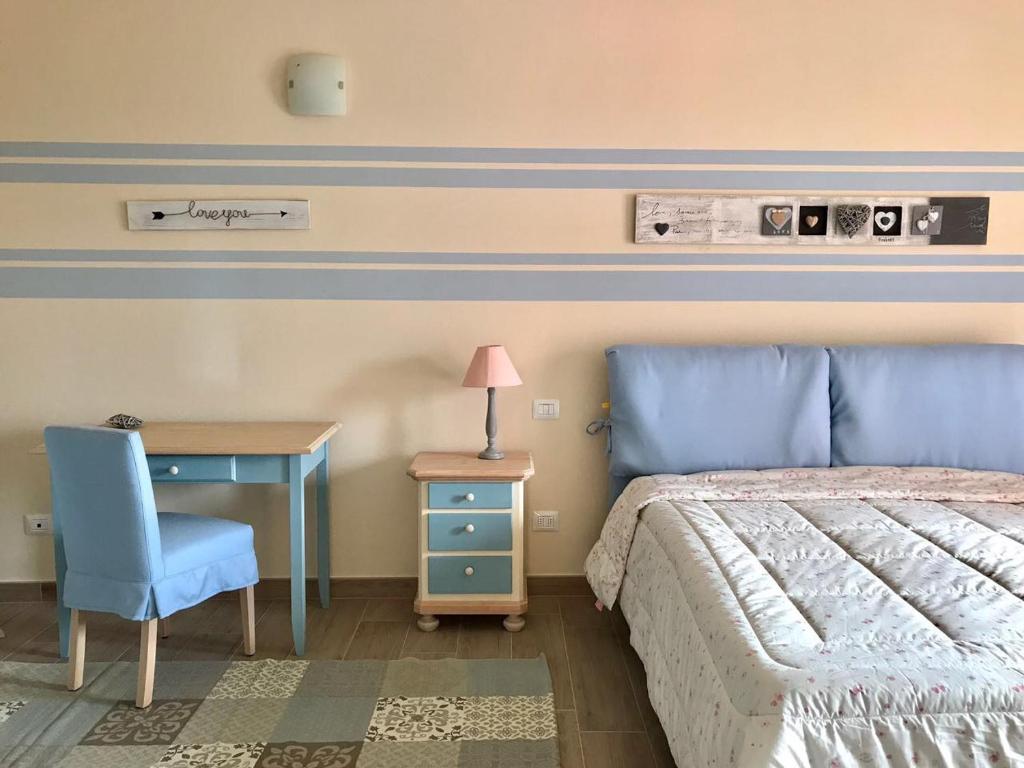Postel nebo postele na pokoji v ubytování Casa Bardalla
