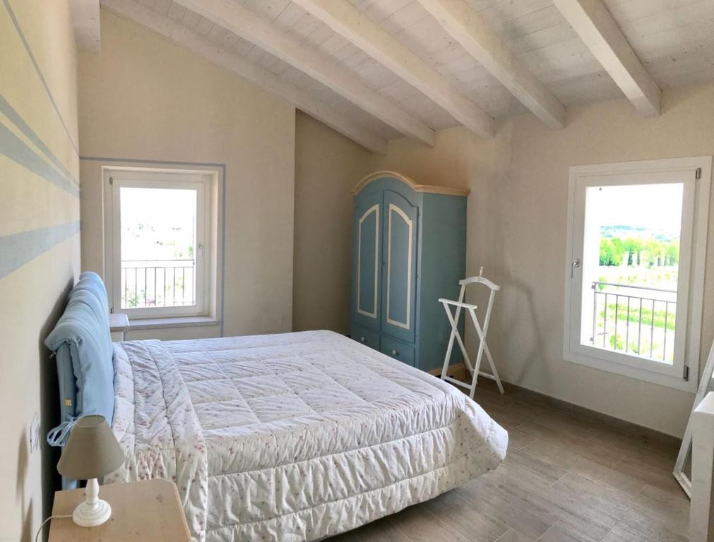 Postel nebo postele na pokoji v ubytování Casa Bardalla