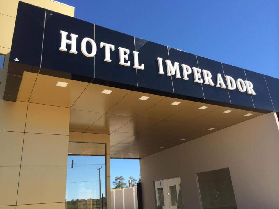a hotel imperial sign on the side of a building at Hotel Imperador in Gurupi