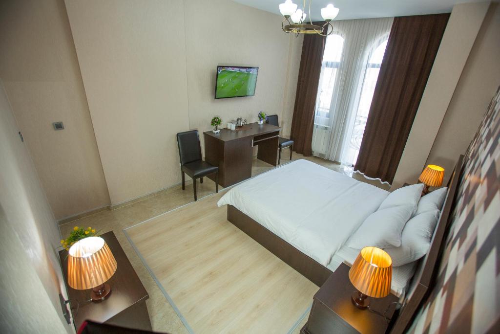 TV a/nebo společenská místnost v ubytování Ire Palace