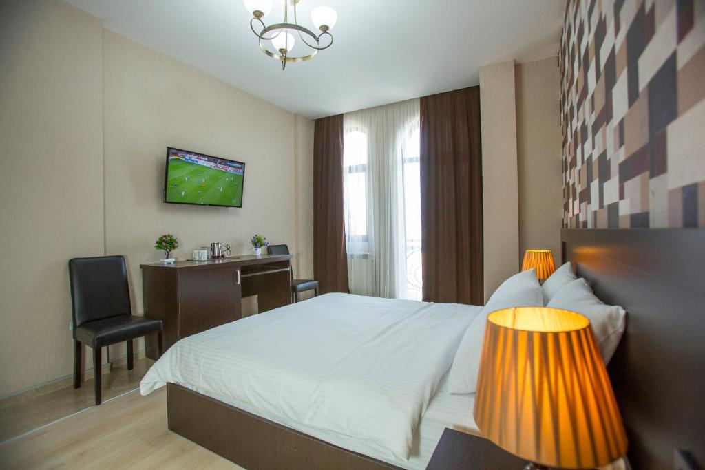 TV a/nebo společenská místnost v ubytování Ire Palace