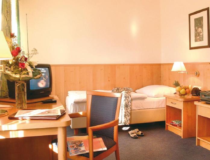 Postel nebo postele na pokoji v ubytování Hotel Geier