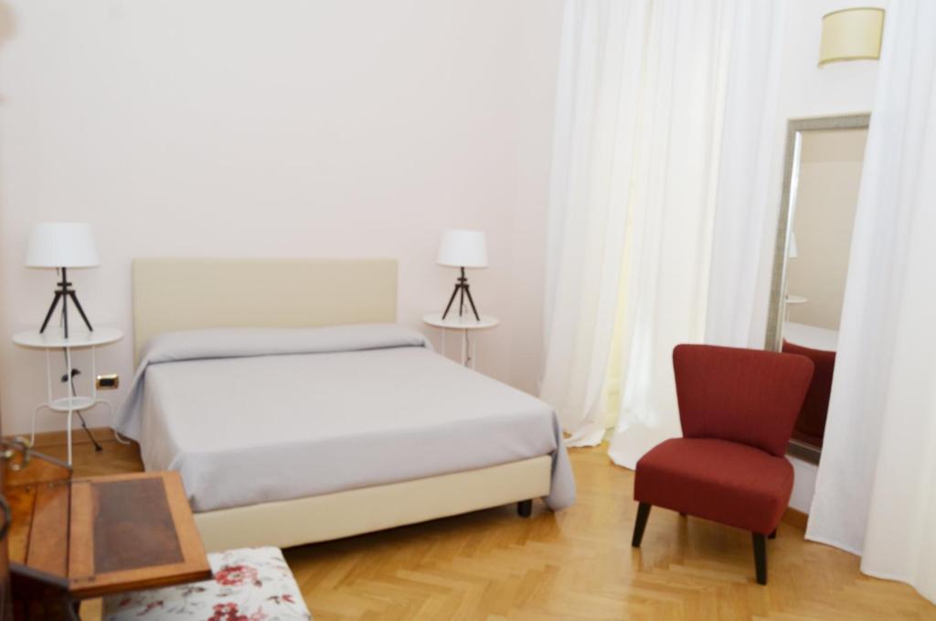 Postel nebo postele na pokoji v ubytování B&B Casa D'alleri