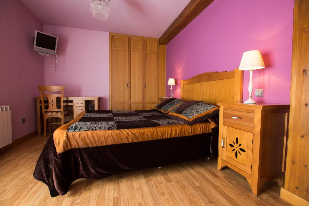 Postel nebo postele na pokoji v ubytování Posada El Arrabal