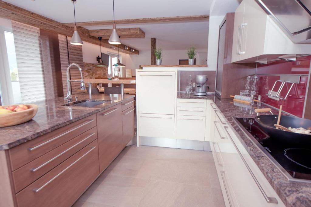 Kuchyň nebo kuchyňský kout v ubytování Inn-Apartments