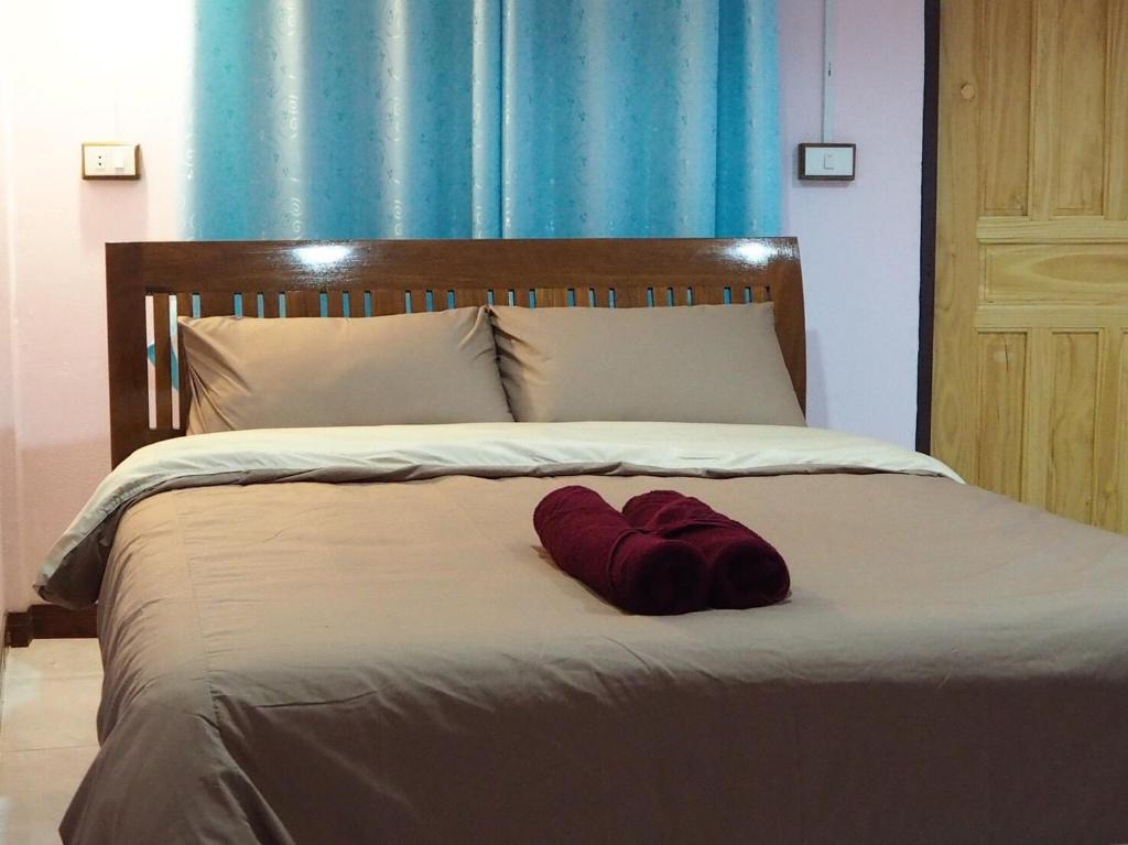 Postel nebo postele na pokoji v ubytování Smile Resort