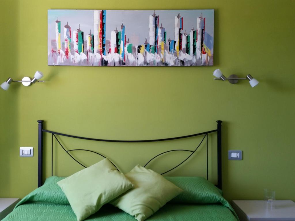 Postel nebo postele na pokoji v ubytování B&B La Costa