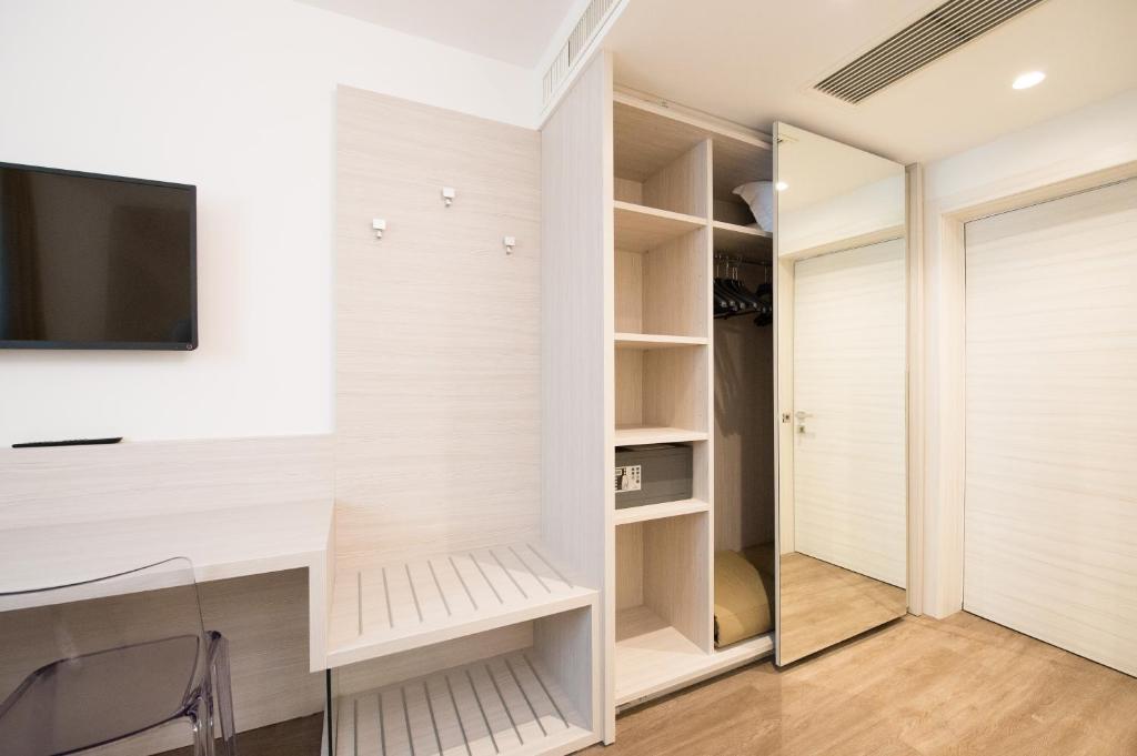 Een TV en/of entertainmentcenter bij Grand Hotel Liberty
