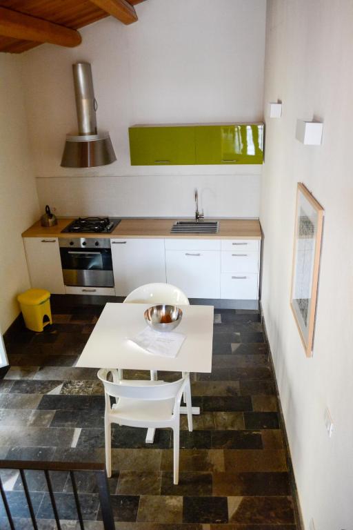 Kuchyň nebo kuchyňský kout v ubytování Hotel Dell'Orologio