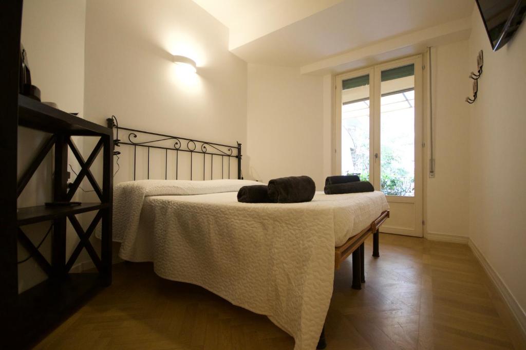 Llit o llits en una habitació de Room Verona Ai Duchi