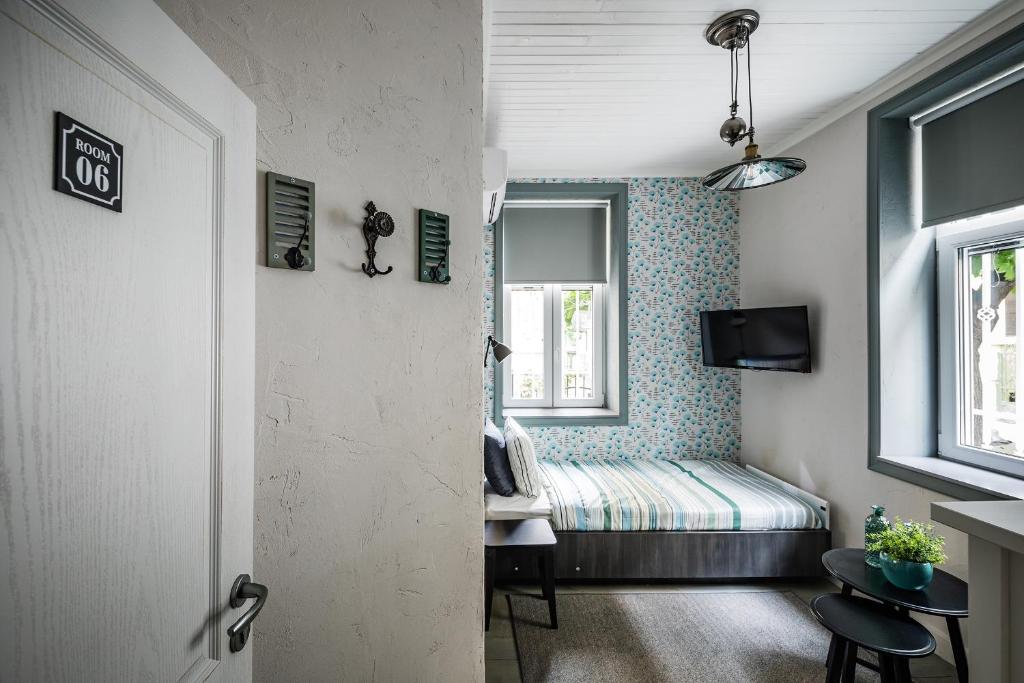 Postel nebo postele na pokoji v ubytování 5 Vintage Guest House