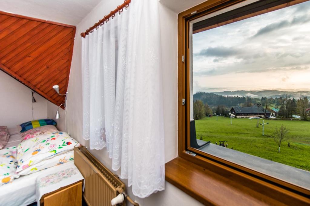 Postel nebo postele na pokoji v ubytování Penzion Benecko 171