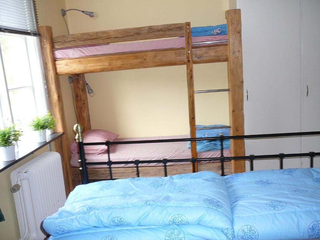 Postel nebo postele na pokoji v ubytování Lönneberga Vandrarhem & Hostel