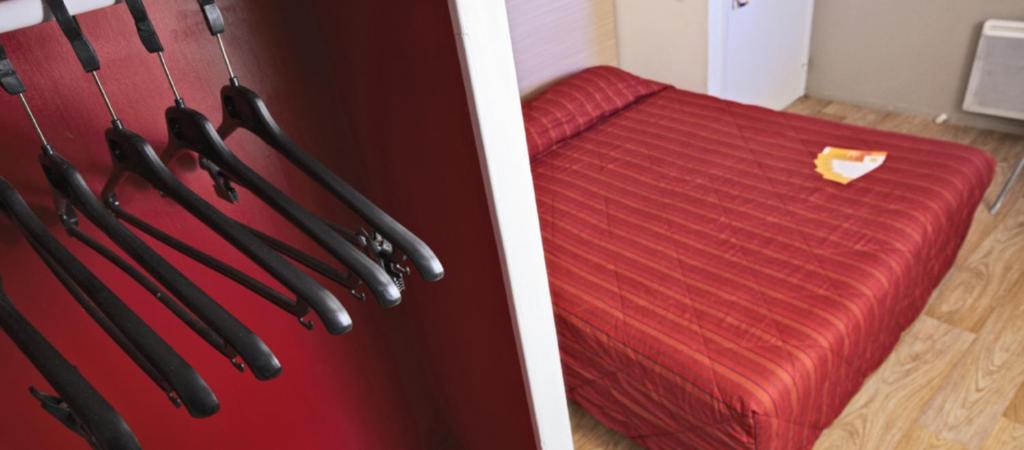 Postel nebo postele na pokoji v ubytování Hotel HECO Lyon sud Vienne