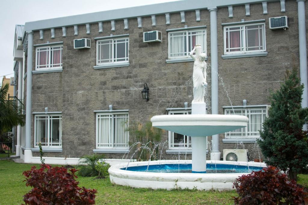 Πισίνα στο ή κοντά στο La Fuente Apart Hotel