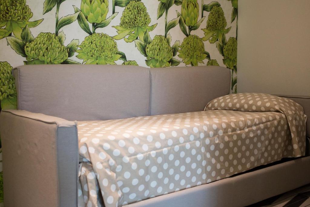 Postel nebo postele na pokoji v ubytování Orchidea