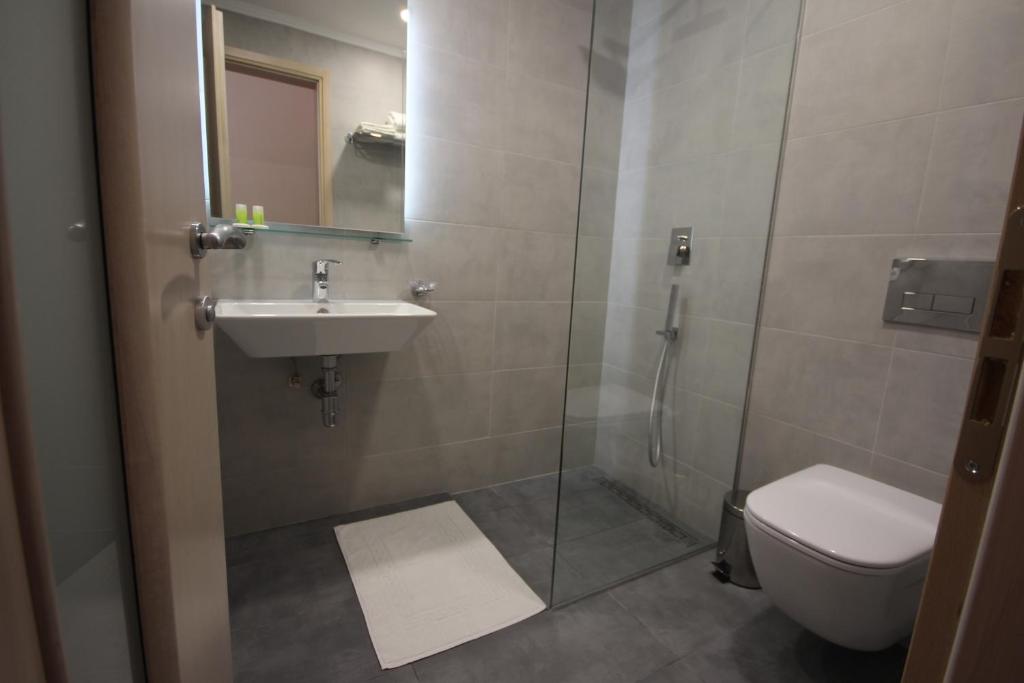 Koupelna v ubytování Hotel Ari