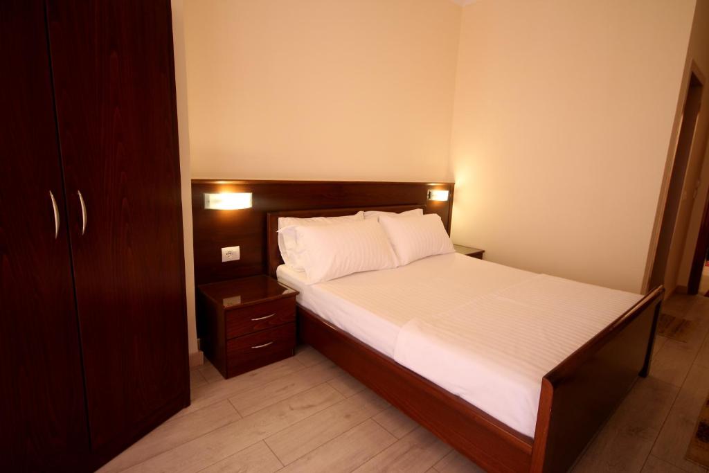 Postel nebo postele na pokoji v ubytování Hotel Ari