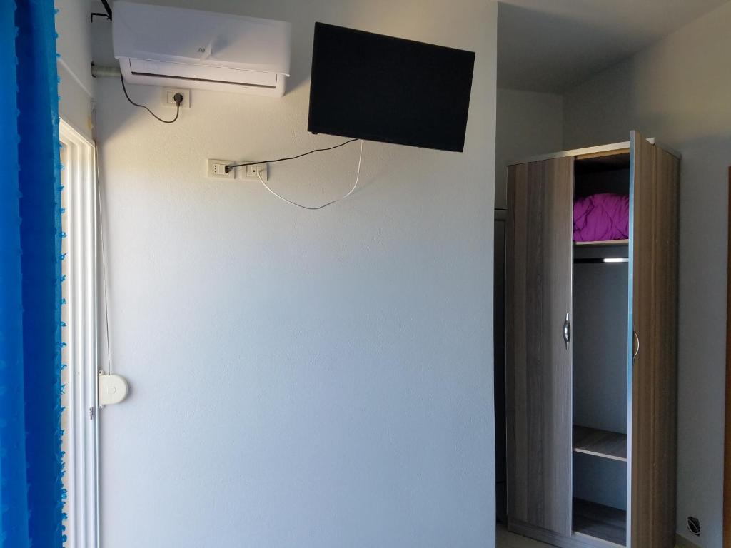 TV a/nebo společenská místnost v ubytování Sunset Hotel Roza