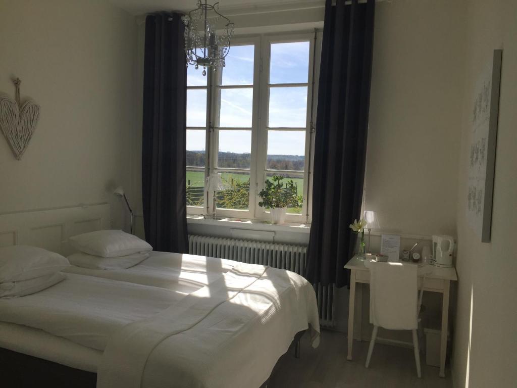 Postel nebo postele na pokoji v ubytování Wramsta B&B