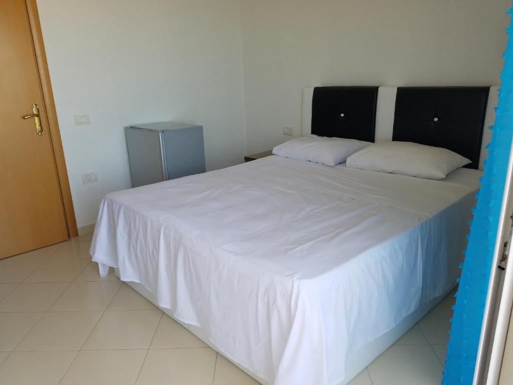 Postel nebo postele na pokoji v ubytování Sunset Hotel Roza