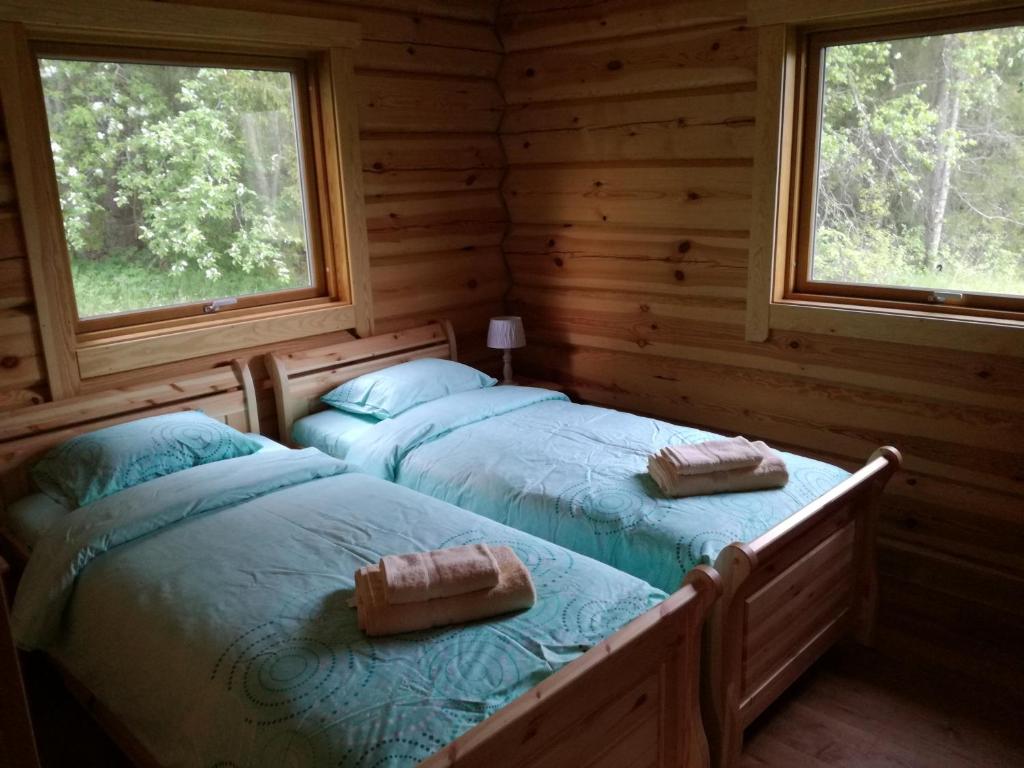 Postel nebo postele na pokoji v ubytování Miilimäe Guesthouse