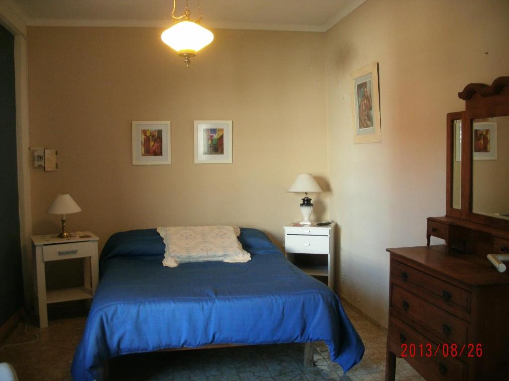 Cama o camas de una habitación en El cerezo