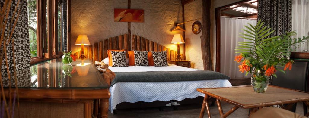 Postel nebo postele na pokoji v ubytování Casa de Piedra