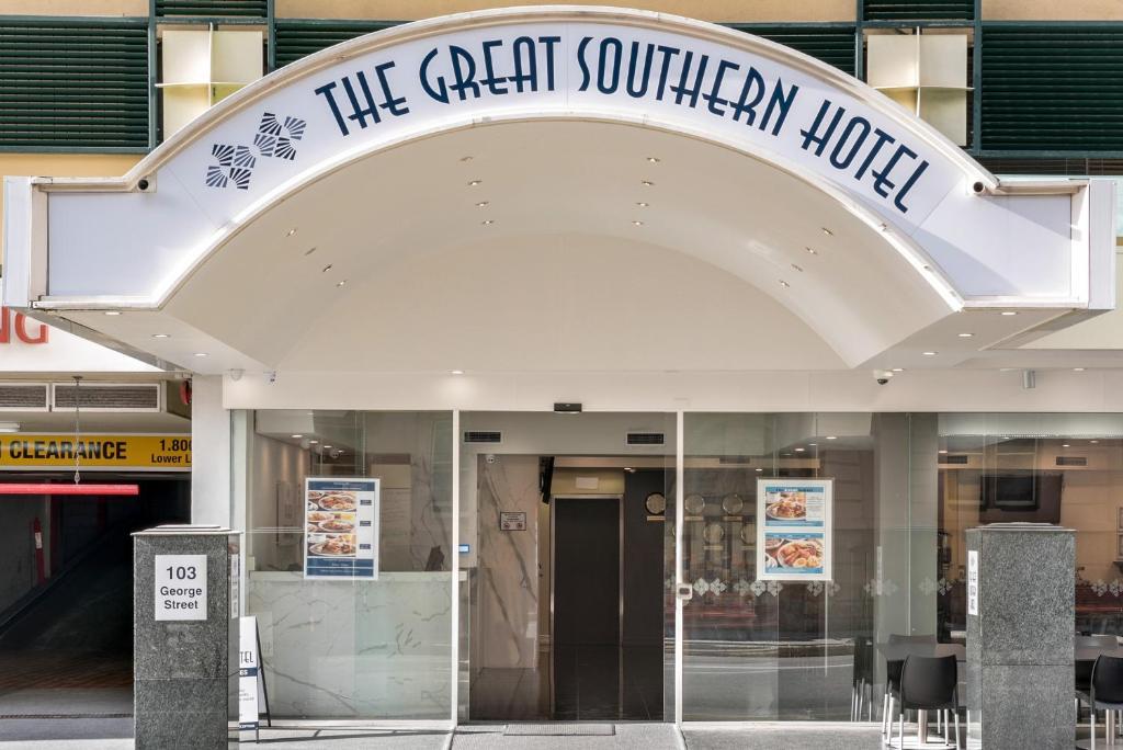a building with a sign on the front of it at Great Southern Hotel Brisbane in Brisbane