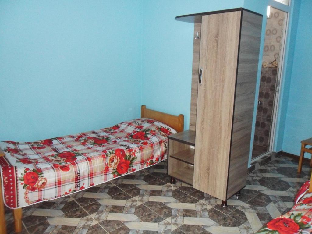 Postel nebo postele na pokoji v ubytování Guest House Nika