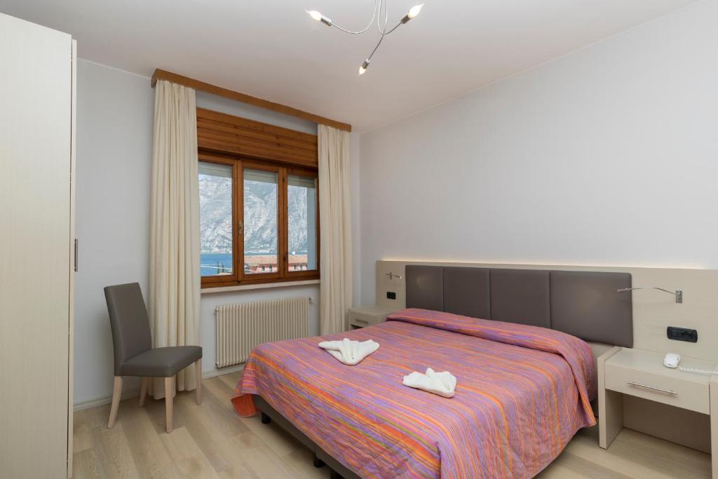 Postel nebo postele na pokoji v ubytování Garnì Casa Rabagno