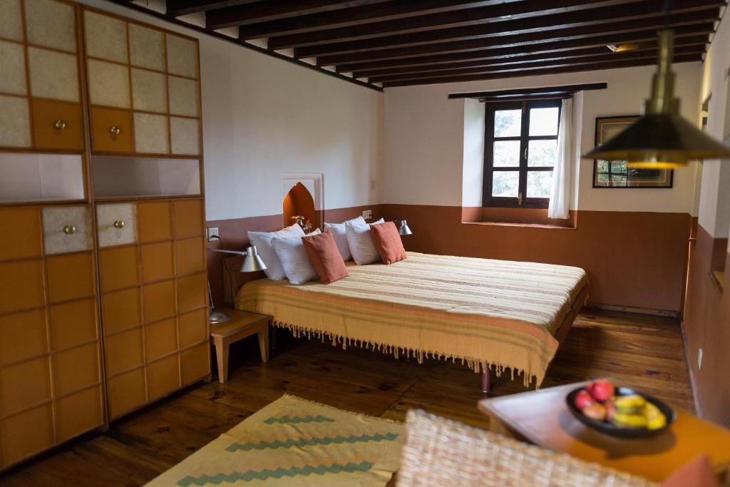 Postel nebo postele na pokoji v ubytování Milla Guesthouse Bhaktapur