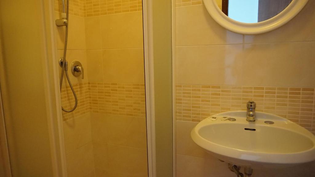 Koupelna v ubytování Hotel Daria