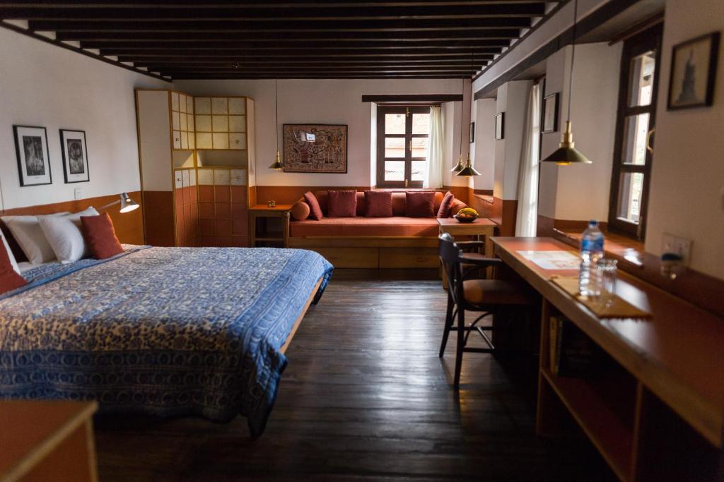 Postel nebo postele na pokoji v ubytování Milla Guesthouse Bhaktapur