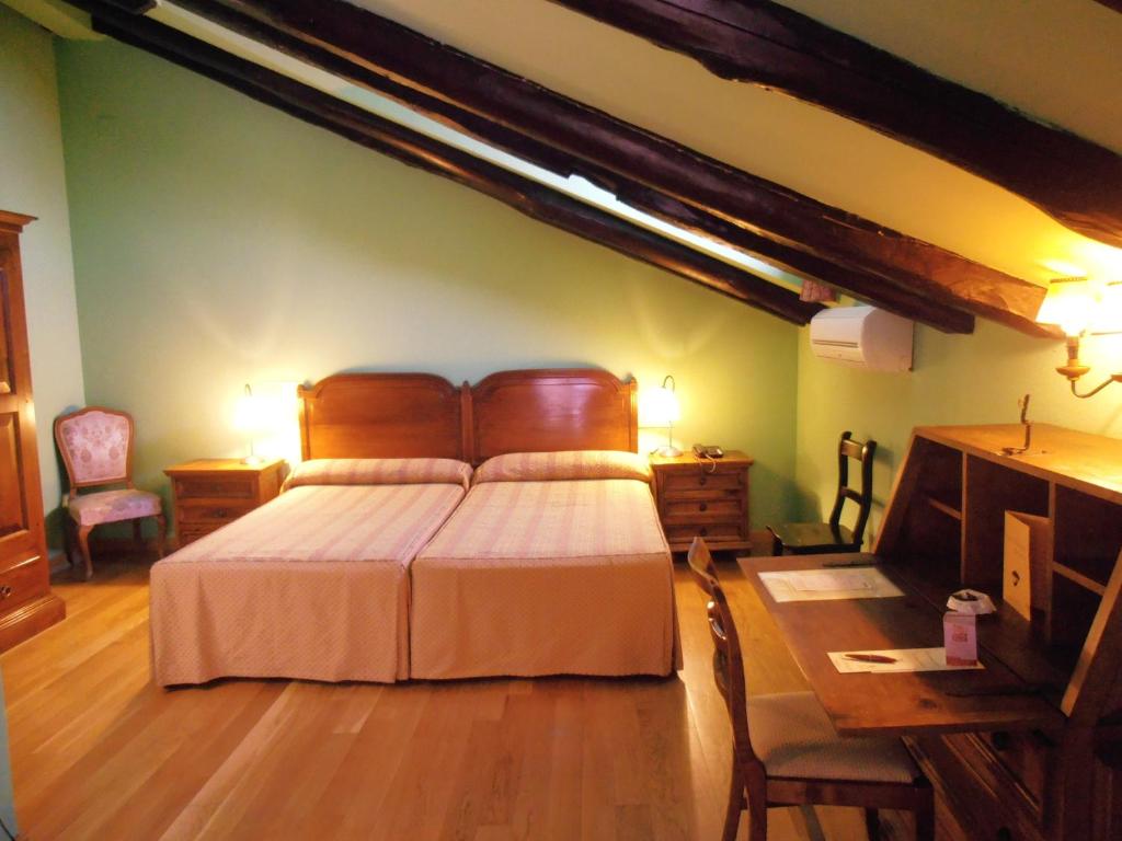 Postel nebo postele na pokoji v ubytování Hotel La Posada Regia