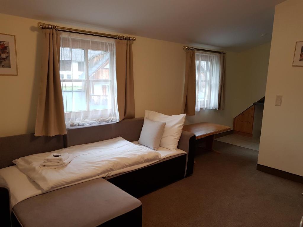 Postel nebo postele na pokoji v ubytování Hotel Tauplitzerhof