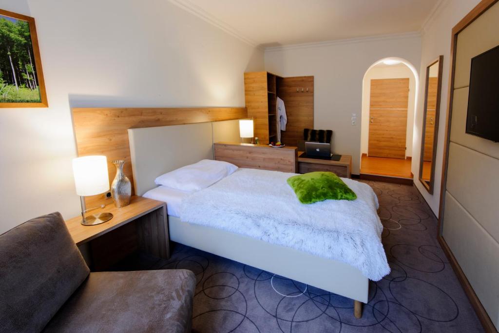 Postel nebo postele na pokoji v ubytování Seminarhotel Lengbachhof GmbH