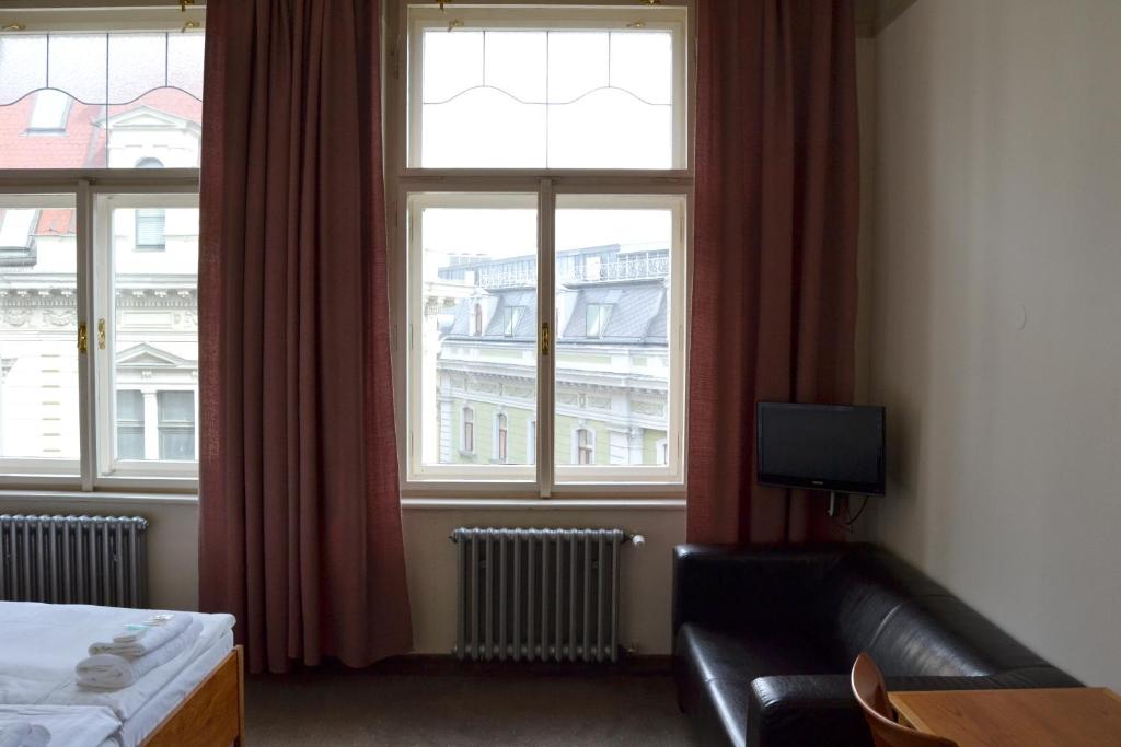 TV a/nebo společenská místnost v ubytování Hotel Praha Liberec