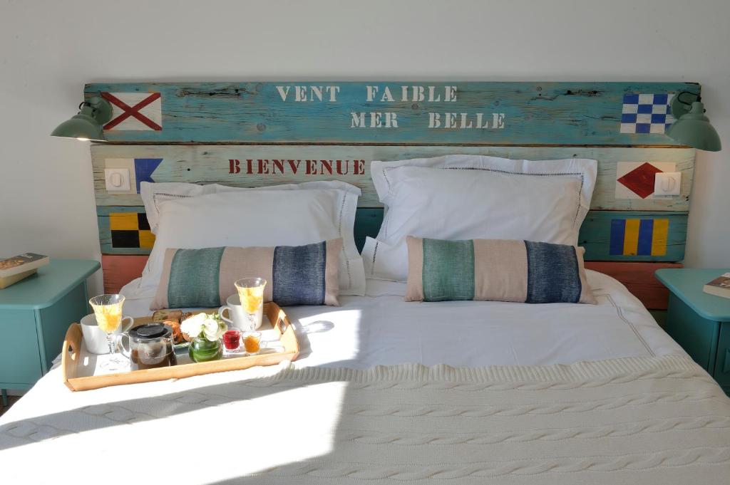 Postel nebo postele na pokoji v ubytování B&B Villa Du Roc Fleuri