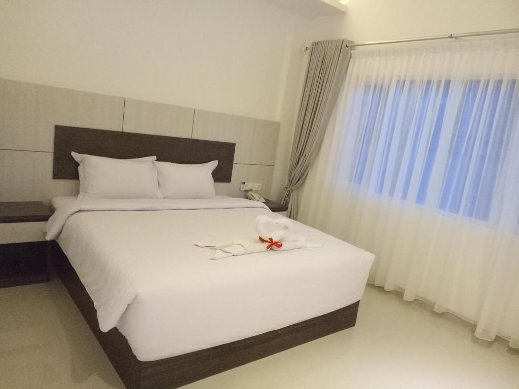 Postel nebo postele na pokoji v ubytování Seventeen Hotel