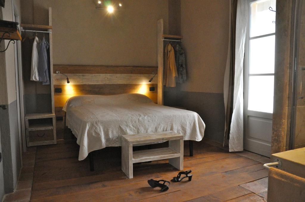 Postel nebo postele na pokoji v ubytování B&B Il Molinello