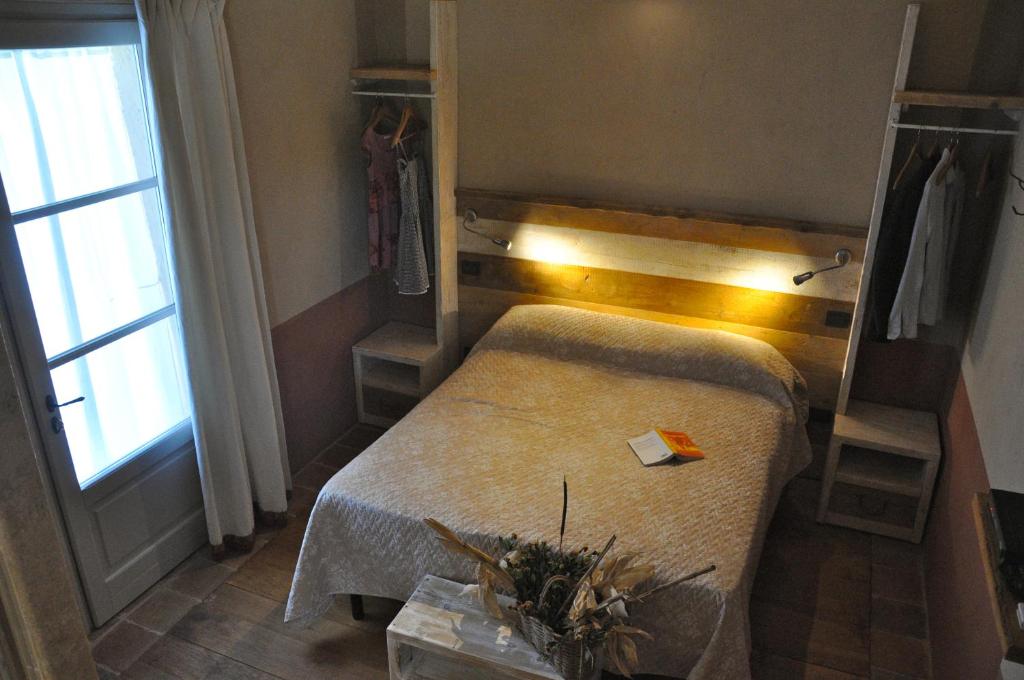 Postel nebo postele na pokoji v ubytování B&B Il Molinello